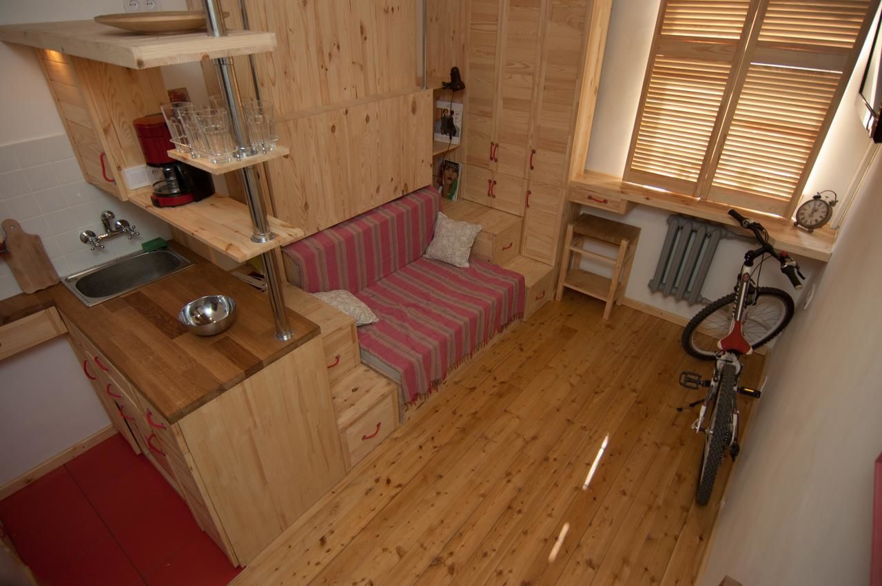 Апартаменты A cozy wooden studio in a heart of Kharkiv Харьков