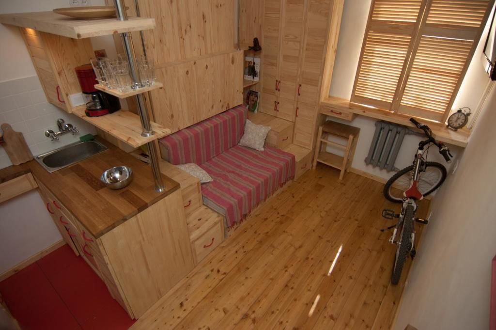 Апартаменты A cozy wooden studio in a heart of Kharkiv Харьков