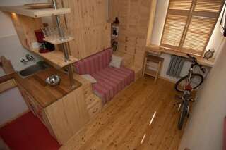 Апартаменты A cozy wooden studio in a heart of Kharkiv Харьков Апартаменты-21